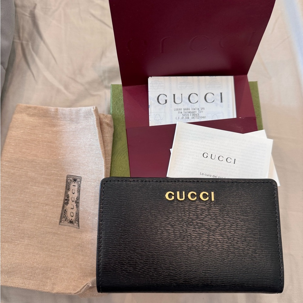 Gucci Black Leather Wallet with Gold Lettering